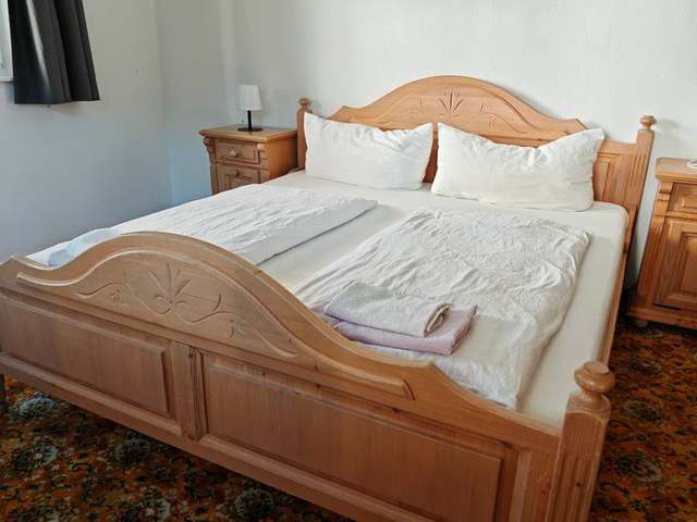 Parterre Apartment Schlafzimmer mit Sessel